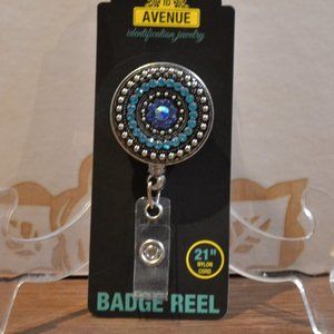 🍂 NWT Blue & Silver Badge Reel
